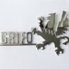 IRI8 Fregio GRIFO GRIFO, cromato, lunghezza mm.70, con 2 perni a tergo