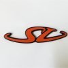 LB23A Scritta SV in alluminio color arancione, lunghezza mm.105, con 2 perni a tergo