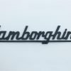 LB29N Scritta LAMBORGHINI nera mm.185, con due perni a tergo