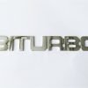 MA14 Scritta BITURBO cromata mm.175 con 3 perni filettati a tergo