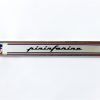 PF55 Fregio PININFARINA rettangolare (anni '80), plastica cromata, mm.142x20, con 3 perni a tergo